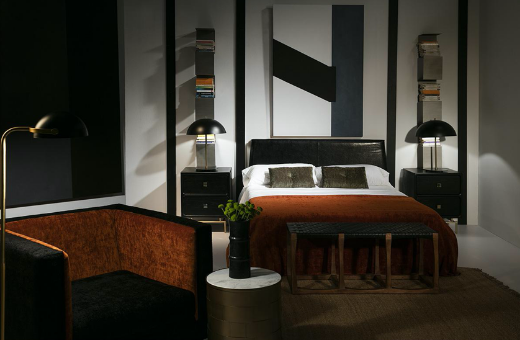 ambientación dormitorio con banco madera piel vintage