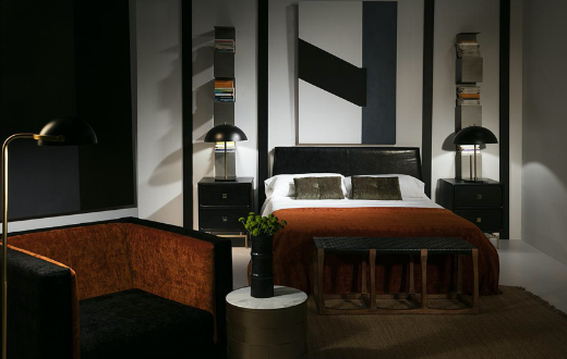 ambientación dormitorio con cama madera p.piel vintage