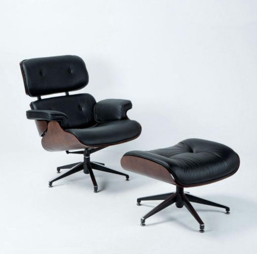imagen sillón y reposapiés madera y piel en negro